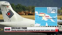 Search and recovery efforts for missing Indonesian flight suspended due to bad weather