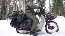 Riding a Honda C90 motorcycle through the Arctic Circle in Winter by Ed March