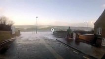 Photgrapher got knocked off from his feet by massive wave