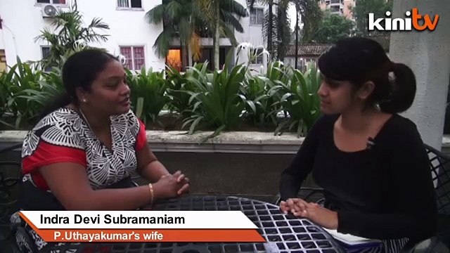 Uthaya's wife on his first day in jail, standing by him & Waytha Moorthy