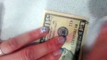 Un billet de 10$ transformé en billet de 50$