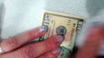 Un billet de 10$ transformé en billet de 50$