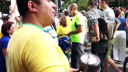 The Brazilian Right Carry Controversial Signs at Protest