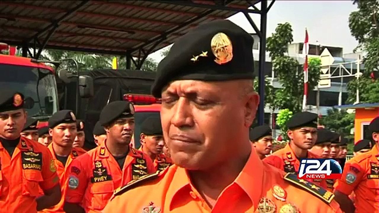 Rescuers race to Indonesian plane crash site