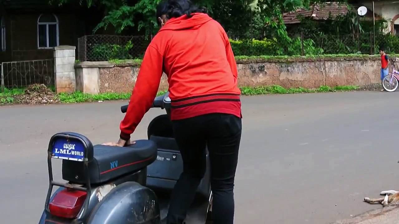 girl riding scooter vespa first time