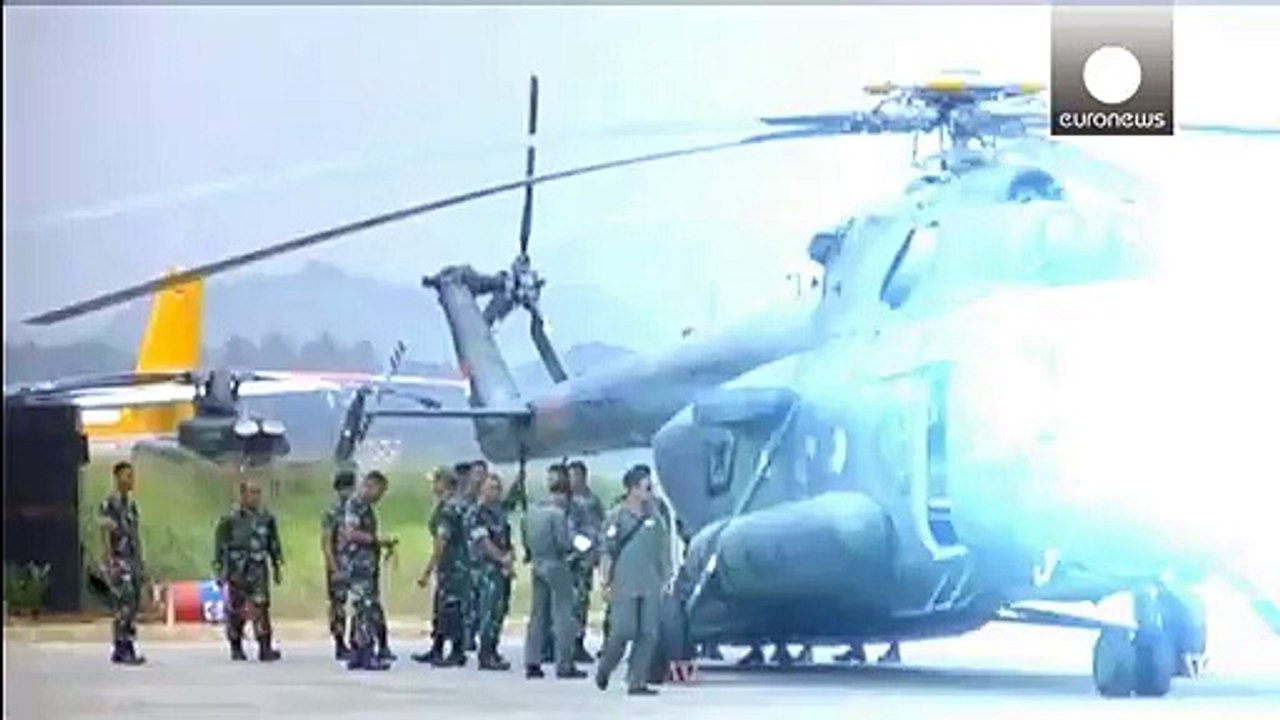 Indonesian rescue teams find 54 bodies at plane crash site