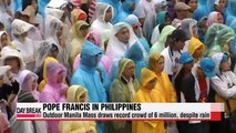 Despite rain, Pope Francis draws record crowd of 6 million in Manila outdoor Mas