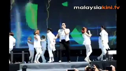 Psy makes it short, sweet and sweaty