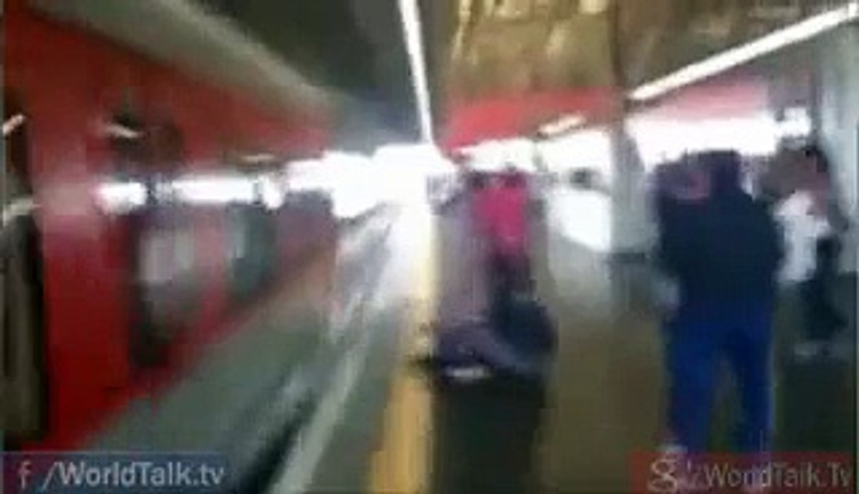 Girl Picked her Cell Phone before the Fast Moving Train - Siyasi Tarka