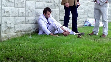 "Drunk" college kid attempts to put his sock on