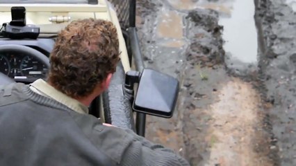 Huge python strikes at safari vehicle