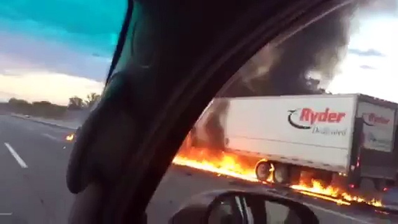 Australian Tourists Save Man From Burning Semi-Truck