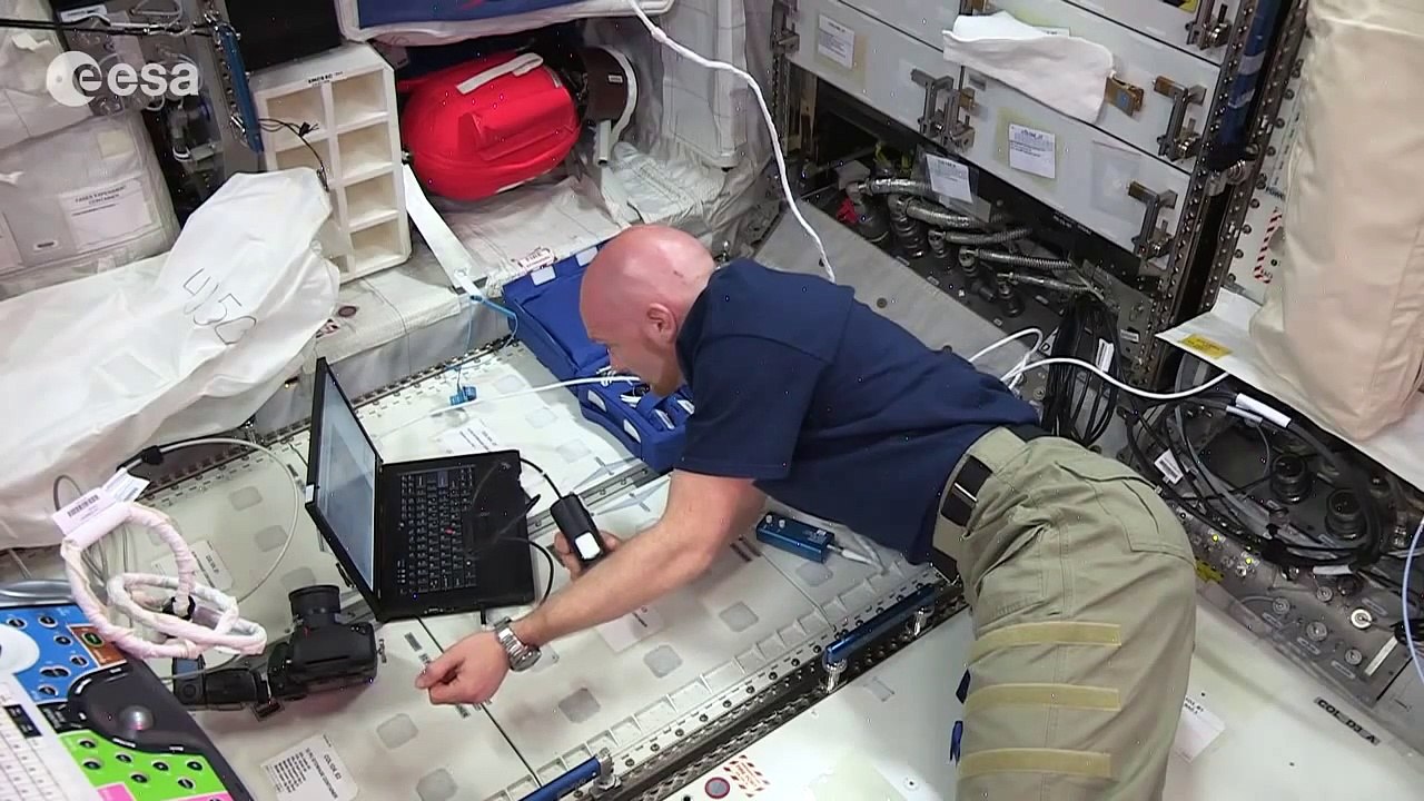 Alexander Gerst working on Skin-B experiment