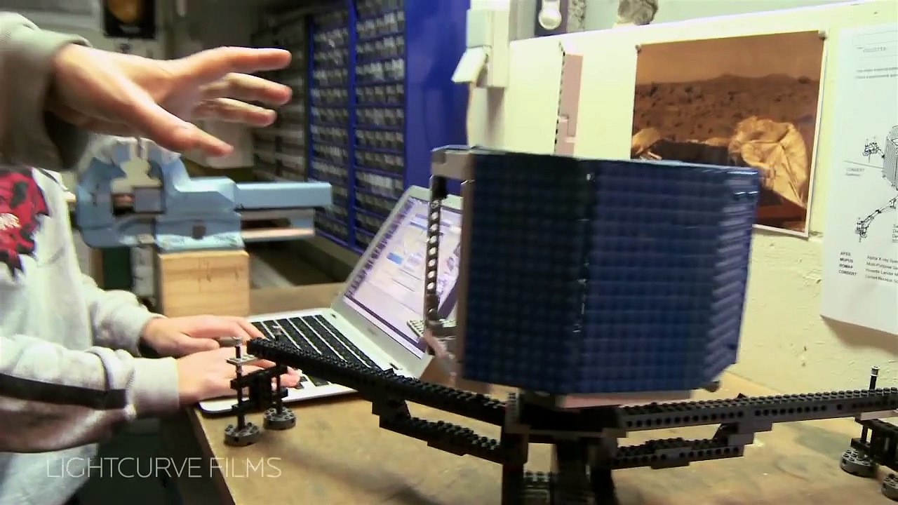 ESA Space Scientist Detlef Koschny demonstrates the prototype LEGO®  Philae lander