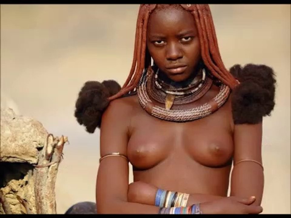 Himba woman life in red skin at namibia