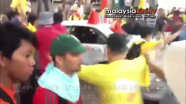 Protesters overturn police car after being hit