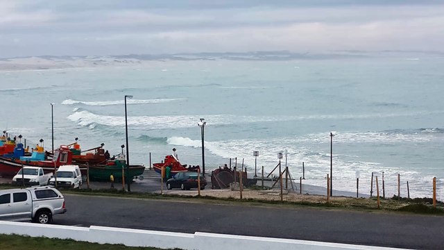 Launching a fishing boat with a tractor