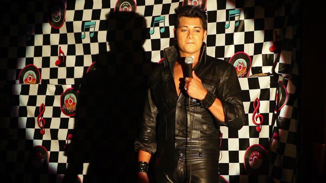 Joseph Hall tells the audience at MJ's Rockin' Oldies that he just signed a deal with HBO Elvis Week 2015