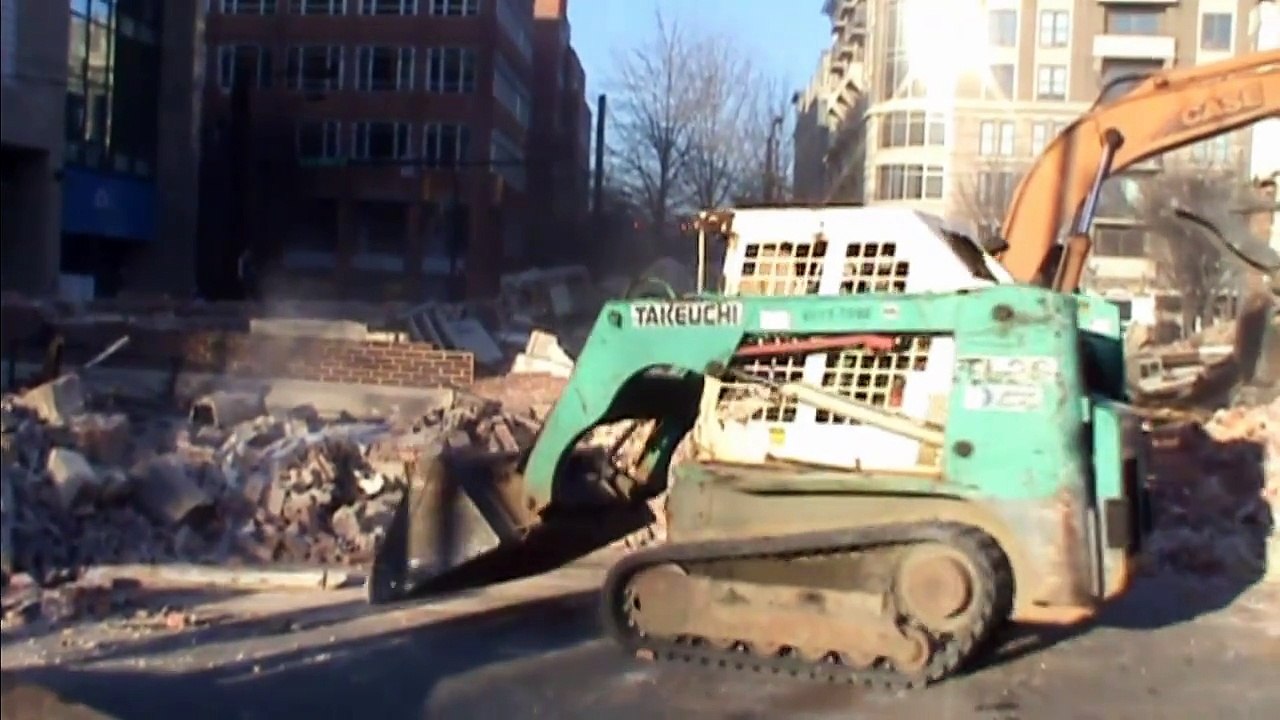 Takeuchi TL-26 Track Loader Moves Demolition Debris