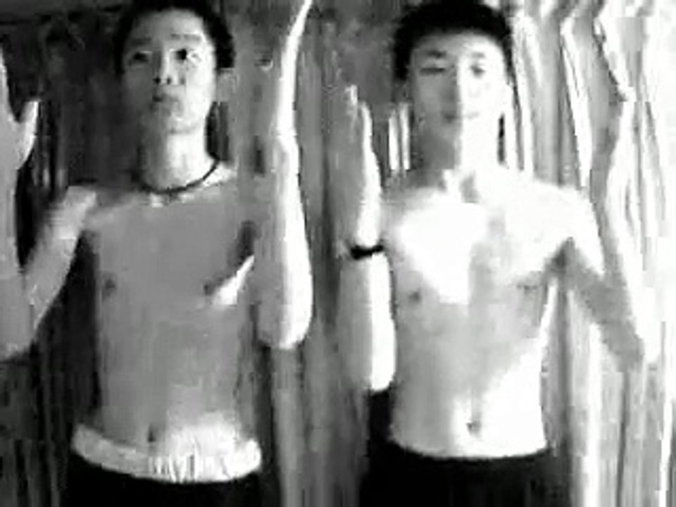 Two Asian guys dancing