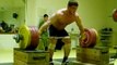 Dmitry Klokov attempting 214 kg snatch from blocks