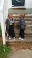 Twins little boys are so cute going down the stairs