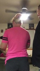 Jealous dog wants to be included in family hug