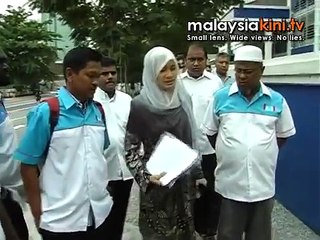 Nurul Izzah lodges report on 'lewd cartoons' of her dad