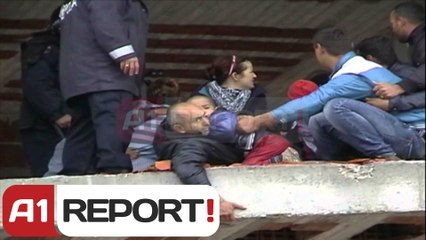 A1 Report - Prindi tenton të hidhet me fëmijën për të mbrojtur ndërtimin pa leje