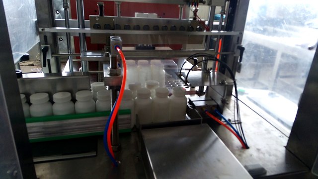 Máy cắt dán màng co PE tự động, máy rút màng co log chai, máy đóng gói log tự động