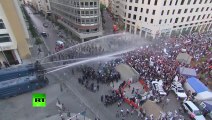 Police violently disperse trash protest in Beirut with water cannons, tear gas