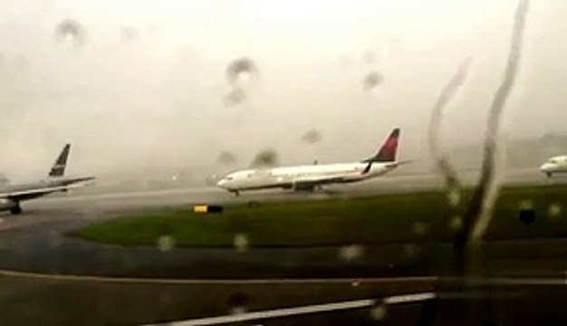Delta Airlines Jet Struck by Lightning bolt in Thunder storms at Atlanta Airport USA