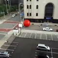 Giant red ball from an art installation broke free in Toledo