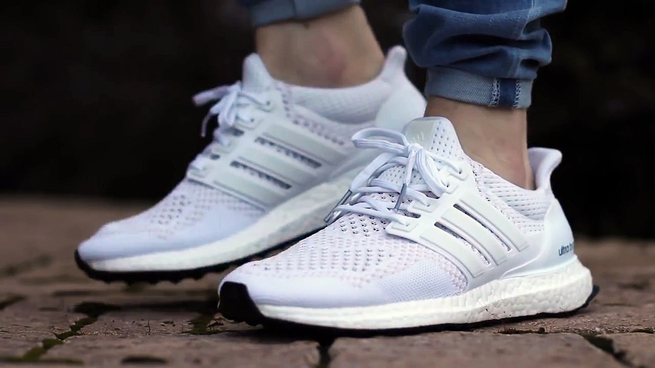 white ultraboost on feet