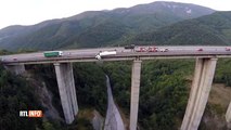Accidented truck suspended 128m above the ground on a Bridge!