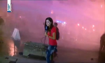 female reporter rushed by mob while on live tv Lebanon