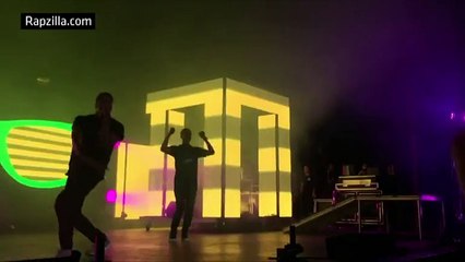 Curry busts a few moves on stage