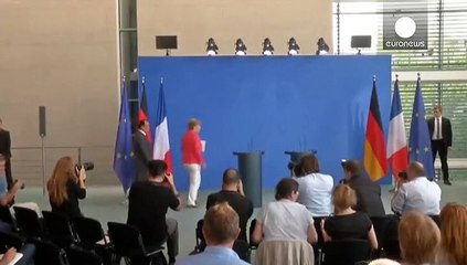 Allemagne : Hollande et Merkel dénoncent un climat anti-migrants