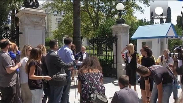 Greek president offers government mandate to new anti-austerity party