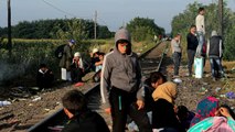 Refugees cross into Hungary before fence goes up