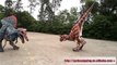 spinosaurus and carnotaurus dinosaur costume fighting