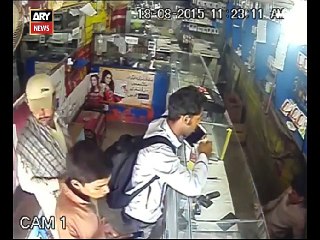 FOOTAGE: Mobile shop robbed in 4 Min (by Faraz Shah)