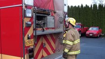 Ladder training involving single firefighter 24' extension ladder raises