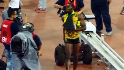 Скачать видео: Usain Bolt : Chinese Cameraman falls on Usain Bolt with segway after Men's 200m Final IAAF 2015