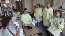 Child life staff brings smile to patient at Helen DeVos Children's Hospital