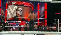 Sting returns and attacks Seth Rollins