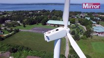 Drone pilot spots man sunbathing on top of wind turbine 200ft above ground