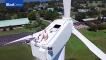 San Diego sunbather on top of wind turbine is surprised by drone
