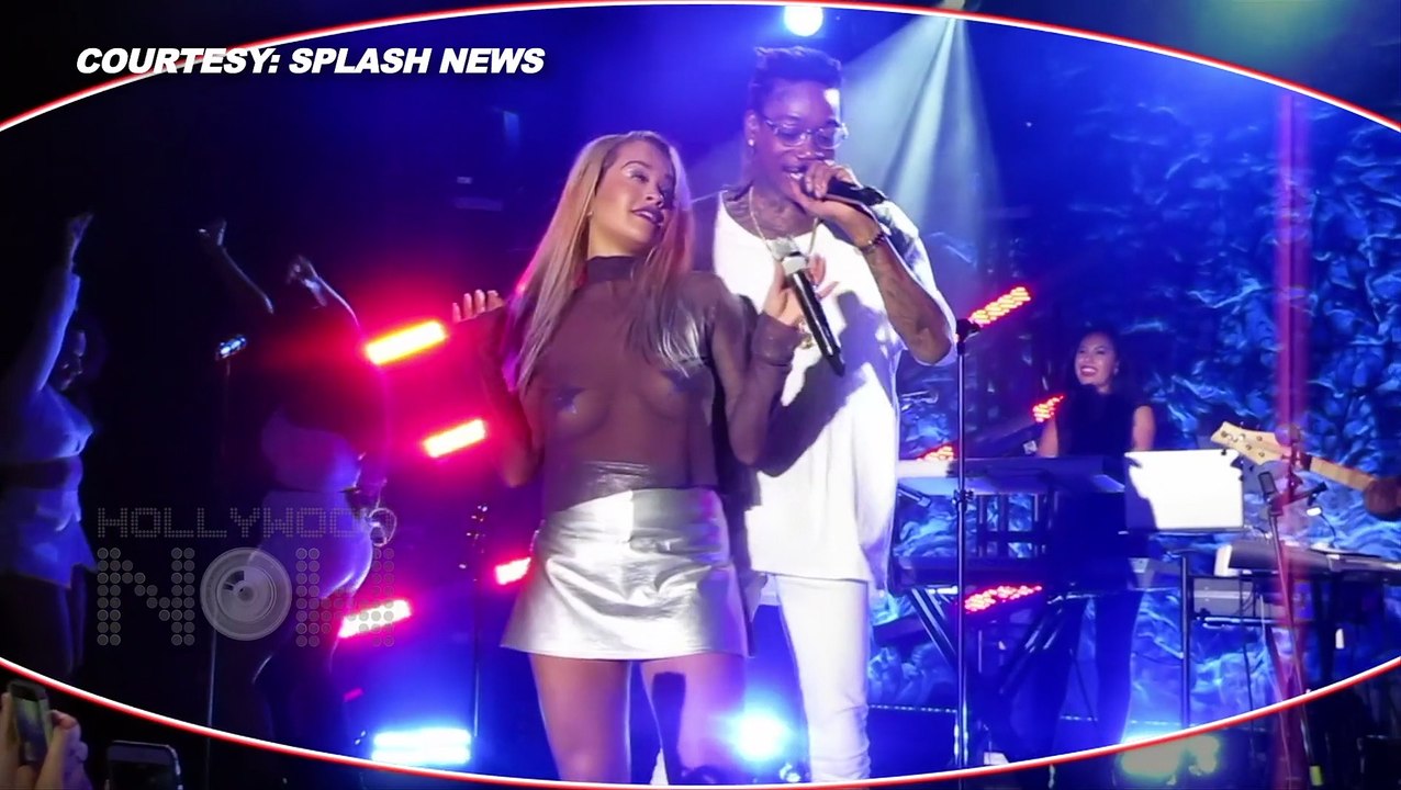 DATING? Wiz Khalifa HUGS Rita Ora | Surprises Her At Concert