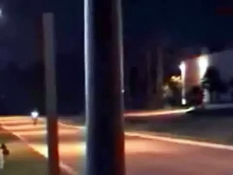 Biker Slides Down Street